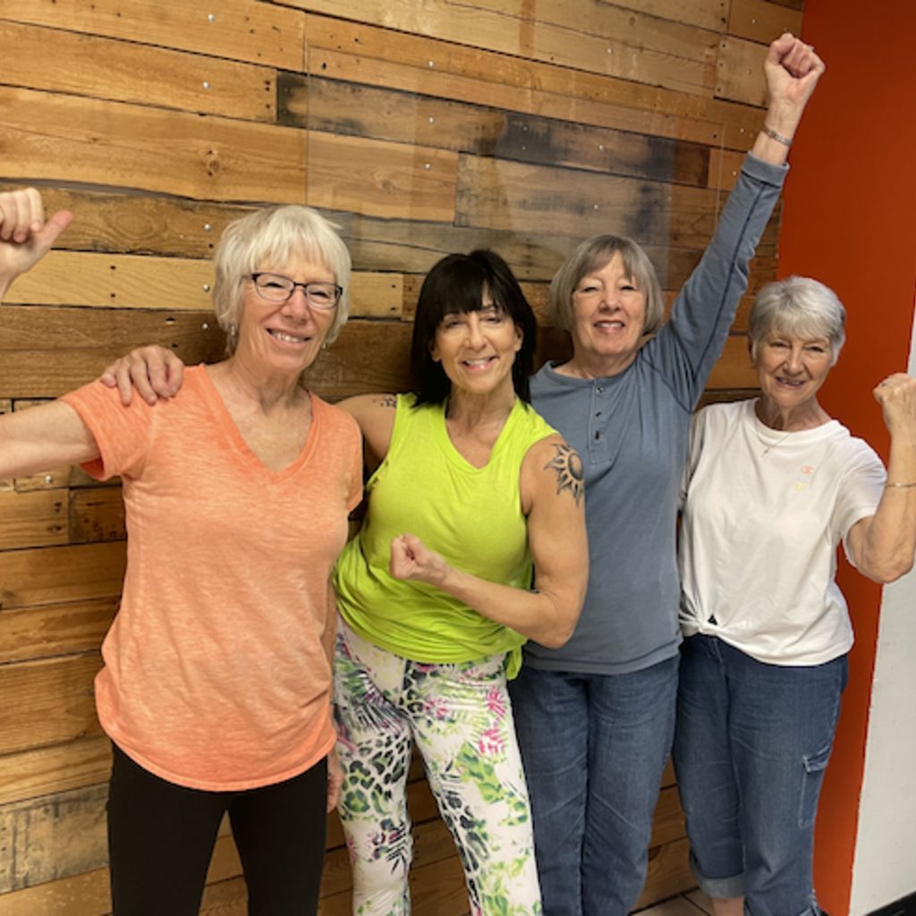 Older adults fitness instructor Shannon Price and class members Deb Schoelerman, Nancy Fischer, and Sharon Johnson.