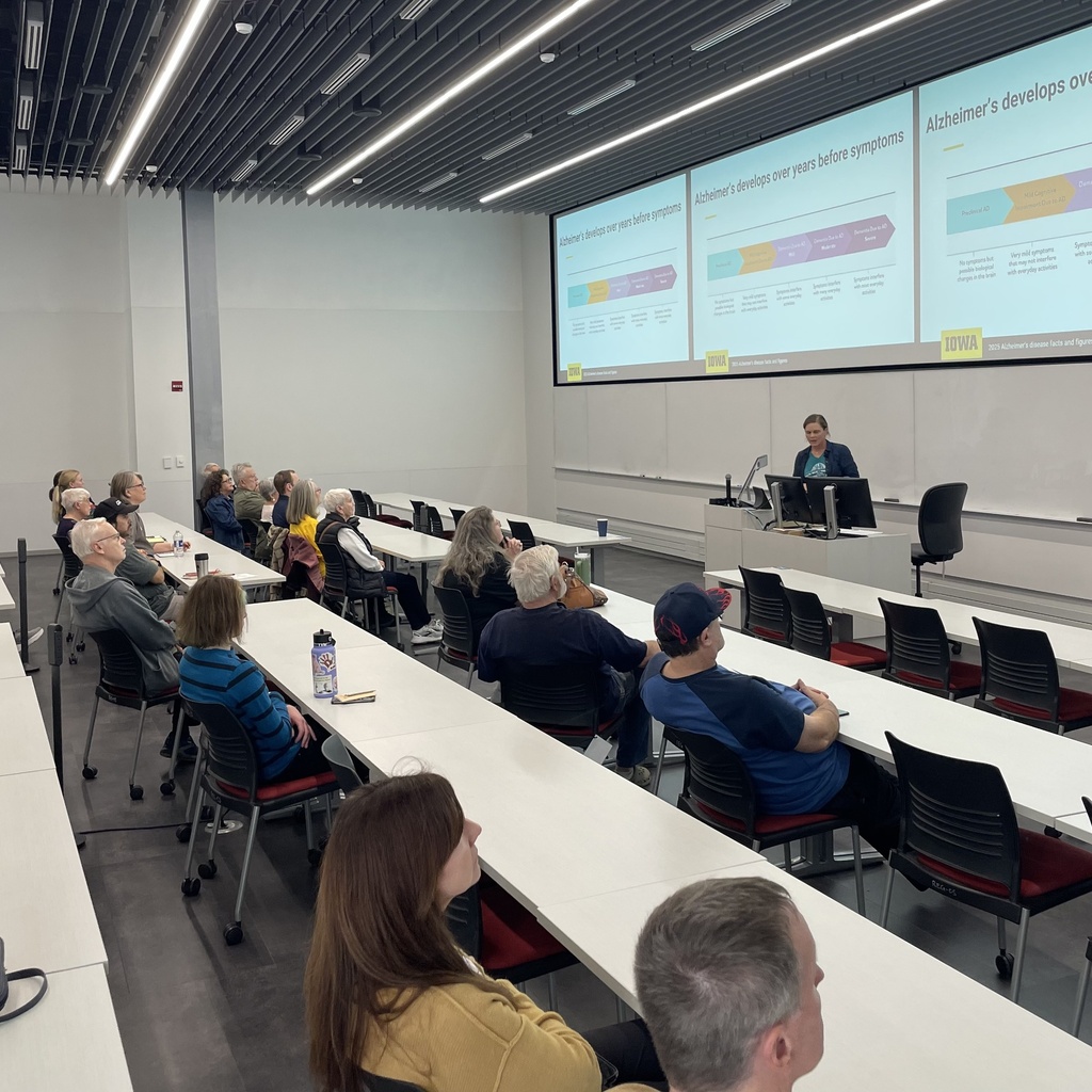 Attentive guests fill a classroom at the Health, Brain &Cognition Lab open house.