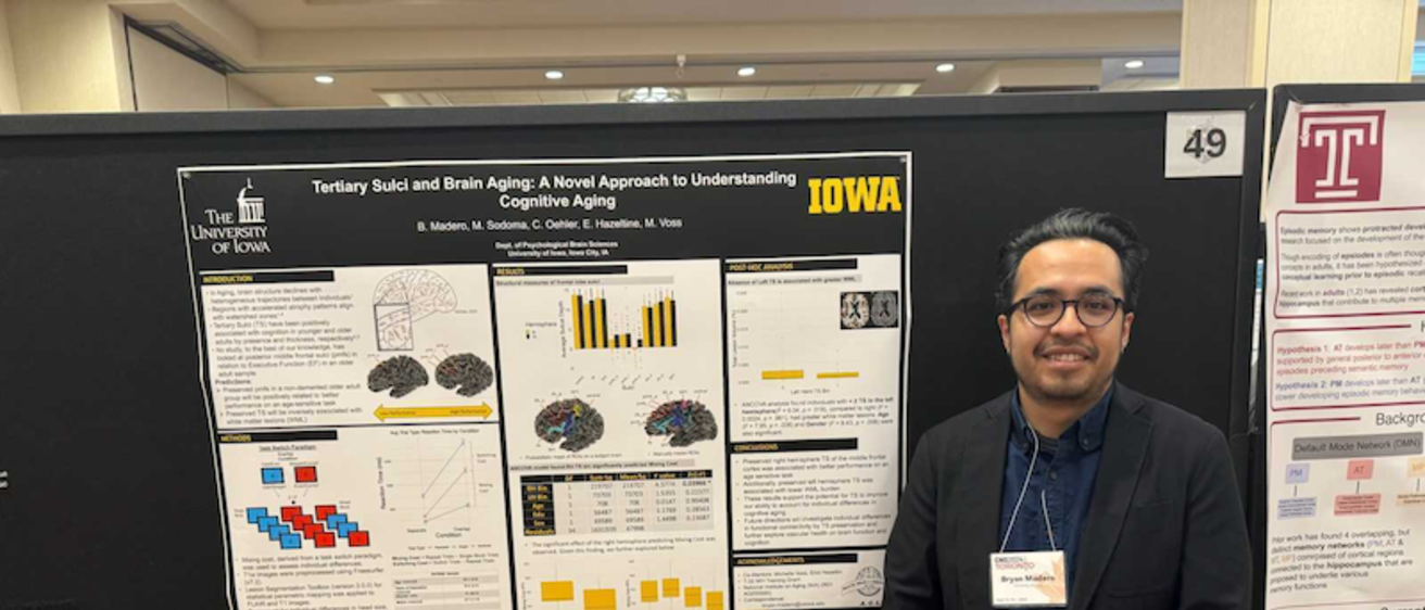 Bryan Madero at conference with poster