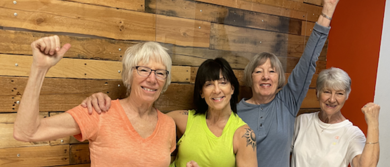 Older adults fitness instructor Shannon Price and class members Deb Schoelerman, Nancy Fischer, and Sharon Johnson.