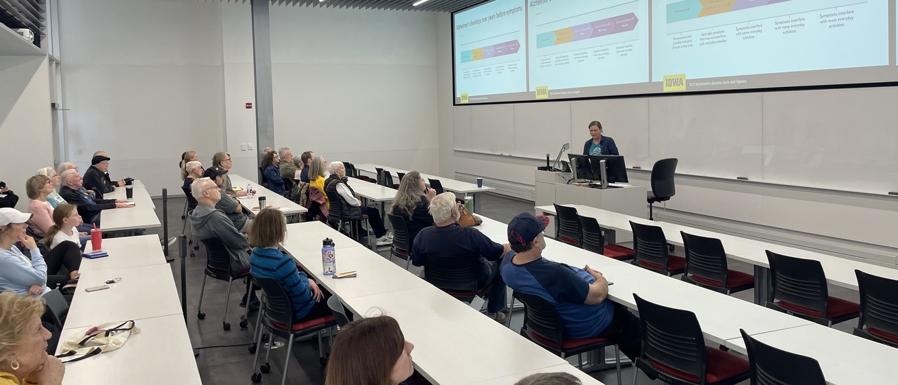 Attentive guests fill a classroom at the Health, Brain &Cognition Lab open house.