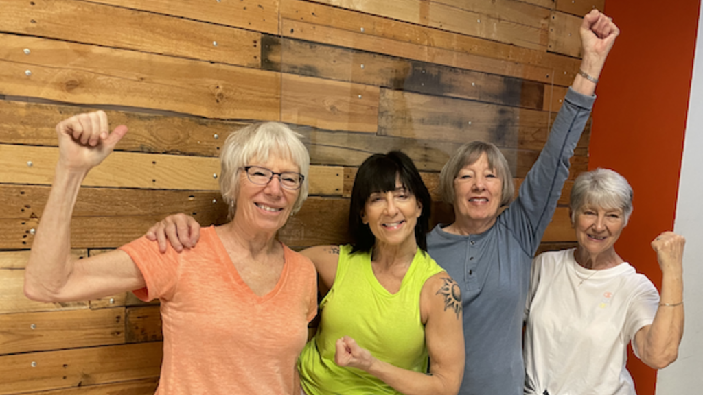 Older adults fitness instructor Shannon Price and class members Deb Schoelerman, Nancy Fischer, and Sharon Johnson.